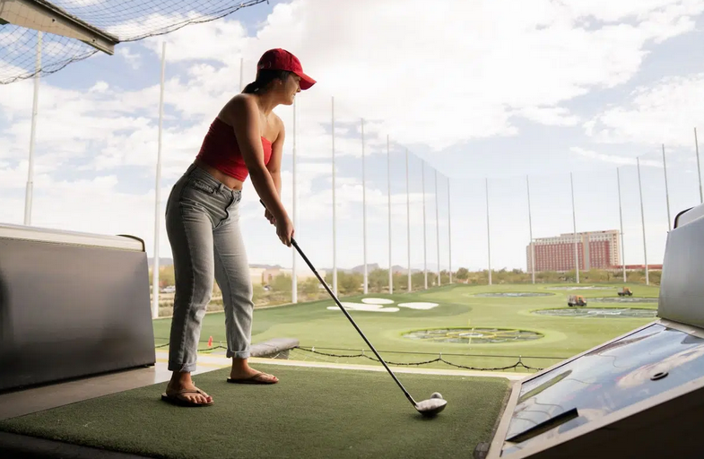 How does Topgolf track balls?